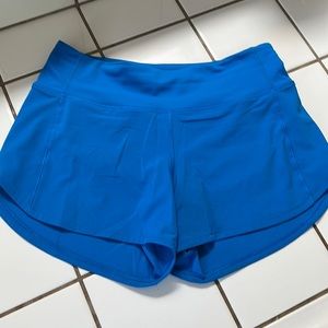 Lululemon Poolside speed up shorts MR 4 inch